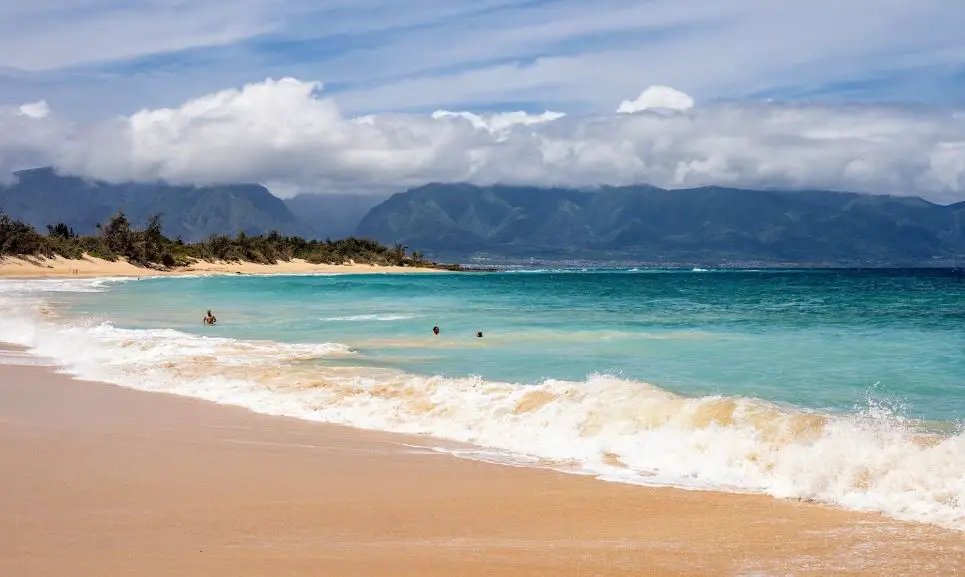 water sports beach in Maui,Olowalu beach in Maui,crescent-shaped beach in Maui,family-friendly beach in Maui,best beach in Maui,busiest beach in Maui, white rock beach in Maui,beautiful white sand beaches in Maui,most beautiful beaches on Maui,Makena Beach in Maui